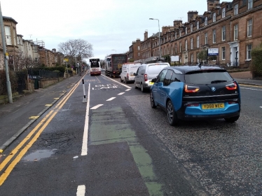 Cycle lane need repair and traffic congestion