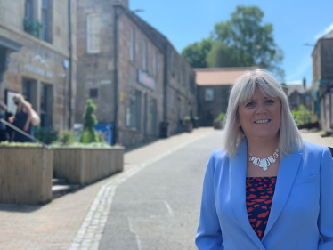 Sue Webber in Blue Blazer